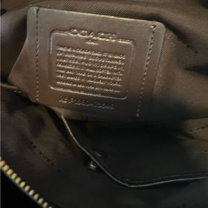 Black Coach Tote Bag Center zip compartment
Snap closure